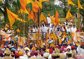 The Akali-BJP candidate arrives in a procession to file his nomination papers in Ludhiana