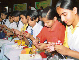 Children during a knitting contest organised in Sector 10 Government Polytechnic College in Chandigarh on Saturday.
