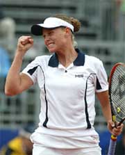 Slovenian Tina Pisnik celebrates victory against Lisa Raymond of the US