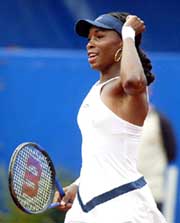 Venus Willliams of the US celebrates victory against Slovenian Katarina Srebotnik