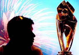A silhouetted view of Indian vice-captain Rahul Dravid in front of the Samsung Cup, which they won in the recently concluded Indo-Pak cricket series