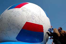 Russians sign a huge soccer ball