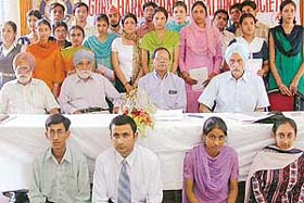 Awardees from different parts of North India with the Vice-Chancellor of Panjab University, Prof K.N. Pathak, at a felicitation ceremony of the Guru Harkrishan Educational Society in Chandigarh