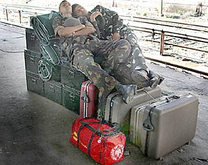 Armymen enjoy a siesta at the Ambala Cantonment railway station on Sunday.