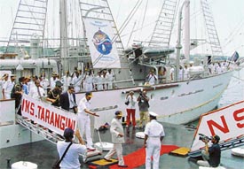 President A.P.J. Abdul Kalam disembarks from INS Tarangini after the ship arrived home at the end of a 15-month world cruise in Kochi