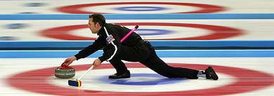 Team Germany's Stephan Knoll delivers a stone