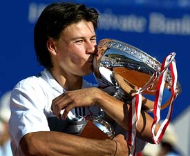 Guillermo Coria of Argentina kisses his cup after he won the final of the Monte Carlo Masters tennis open