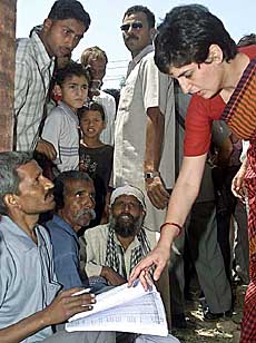 Priyanka Vadra, daughter of Sonia Gandhi, checks the voters� list outside a polling station in Rai Bareli on Monday. 