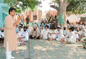 Mr Manish Tewari, MP candidate of the Congress from Ludhiana, addresses villagers of Pabbian