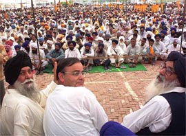 Union Law Minister Arun Jaitley with Mr Parkash Singh Badal and the SAD-BJP Patiala candidate, Capt. Kanwaljit Singh, at a rally at Devigarh in Patiala on Monday. 