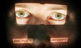 British Passport Office volunteer has his eyes scanned for a biometrics enrolment card 