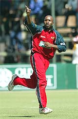 Zimbabwe bowler Tinashe Panyangara celebrates after dismissing Sri Lankan batsman Dilhara Fernando 