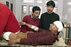 A person who was injured in a militant attack at Handwara police station is treated in a Srinagar hospital