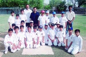 Frank Anthony School principal Stephen D�Costa and former Delhi player Sunil Sudan with the teams before the start of the Master Cup Under-10 Cricket Tournament.
