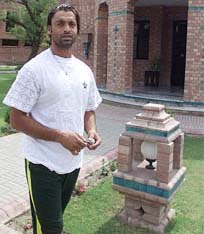 Shoaib Akhtar arrives to appear before a medical commission in Lahore on Wednesday
