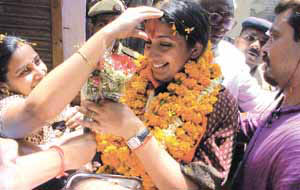 Chandni Chowk BJP candidate Smriti Irani with her fans in the Capital on Thursday.