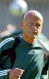 Italian soccer referee Pierluigi Collina warms up before a training session at the UEFA referees� seminar in the Northern Portuguese city of Espinho