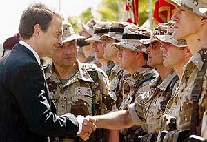 Spanish Prime Minister Jose Luis Zapatero greets Spanish soldiers who have returned from duty in Iraq