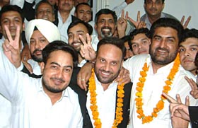 Mr Anmol Rattan Sidhu (right) and Mr Jagjit Singh Gill (centre), newly-elected president and treasurer, respectively, of the Punjab and Haryana High Court Bar Association (HCBA) with their supporters after the declaration of result. 