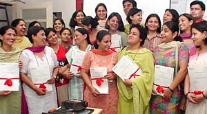 Participants are all smiles at the concluding day of teachers� training workshop at Chitkara Education Trust in Chandigarh, on Friday.