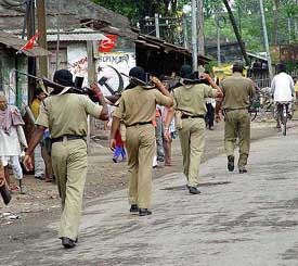 The paramilitary forces take out a flag march in villages of Malda in West Bengal