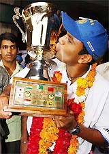 Junior Indian hockey team captain Sandeep Michael kisses the Asia Cup trophy 