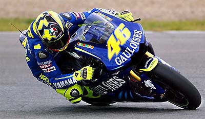 Yamaha's Italian rider Valentino Rossi takes a sharp turn during a practice session ahead of the Spanish MotoGP 