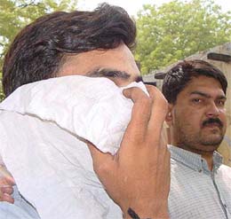 Dr Nikhil Mehrotra and Primal Kumar Thukar, accused in the PMT paper leak case, being produced before a court in Delhi