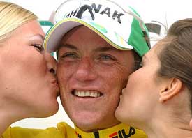 Phonak team rider Tyler Hamilton of the US celebrates on the podium