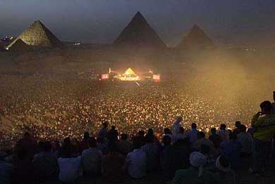 Tens of thousands of Egyptians gather in front of the historical site of the Giza pyramids