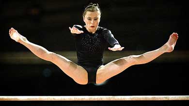 Elena Zamolodchikova from Russia performs on the uneven bars