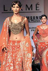 Models presenting the creations of Indian fashion designers Swapan & Seema at the 5th India Fashion Week in the Capital.