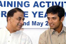 Former Indian captain and National Cricket Academy president Sunil Gavaskar shares a point with Rahul Dravid 