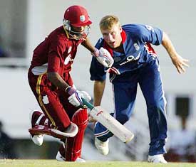 England's Andrew Flintoff tries to run out West Indies batsman Dwayne Bravo during the one-day international match