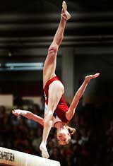 Svetlana Khokina of Russia performs on the balance beam during the women's European Artistic Gymnastics Championships