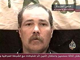 A television image shows US hostage Thomas Hamill