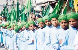 Children wearing green turbans form a queue outside the Jama Masjid, Ludhiana, to offer prayers on the occasion of Id-Milad-un-Nabi 