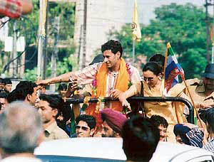 Punjabi singer Harbhajan Mann meets people during a road show of Lok Bhalai Party candidate Balwant Singh Ramoowalia on Monday