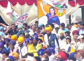Supporters listen to Congress President Sonia Gandhi at a rally in Phagwara on Monday.