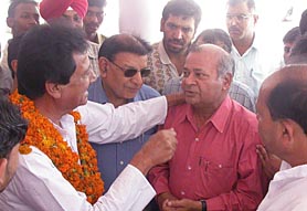 INLD candidate for the Chandigarh Lok Sabha seat Harmohan Dhawan during the campaign in Sector 7 on Tuesday.