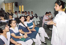 US-based artist Preeti Sahota interacts with  schoolchildren in Chandigarh 