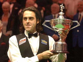 England's Ronnie O'Sullivan holds the trophy after beating Scotland's Graeme Dott 18-8 to win the final of the World Snooker Championship at the Crucible, Sheffield