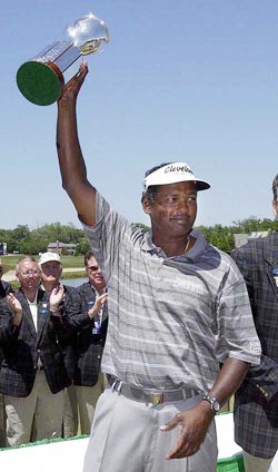 Vijay Singh holds up the winners trophy after winning the rain-delayed HP Classic at England Turn Golf and Country Club in New Orleans