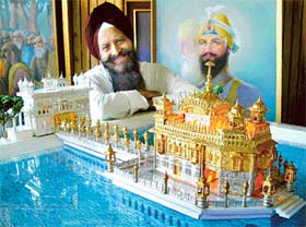 Artist Devinder Singh with his model of the Golden Temple in Chandigarh