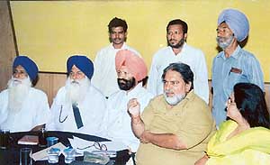 BSP state general secretary Col Partap Singh Phulka and party candidate from Ludhiana Ravinder Singh Sohil at a press conference in Ludhiana on Wednesday. 
