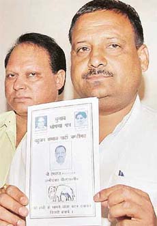 BSP candidate Hem Raj Kashyap releases the party manifesto at a hotel in Sector 35, Chandigarh