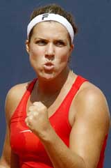 US tennis star Jennifer Capriati reacts during her match against Maria Sharapova of Russia 