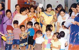 Kids of Children�s Valley School, Ludhiana, with their mothers during the Mother�s Day celebrations in the school