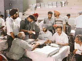 Election staff at the Shastri Badminton Hall in Ludhiana on Thursday
