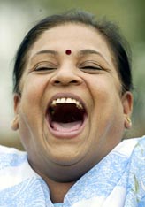 Laughter Club member Prafulla Bhatia participates in a laughing session in Mumbai